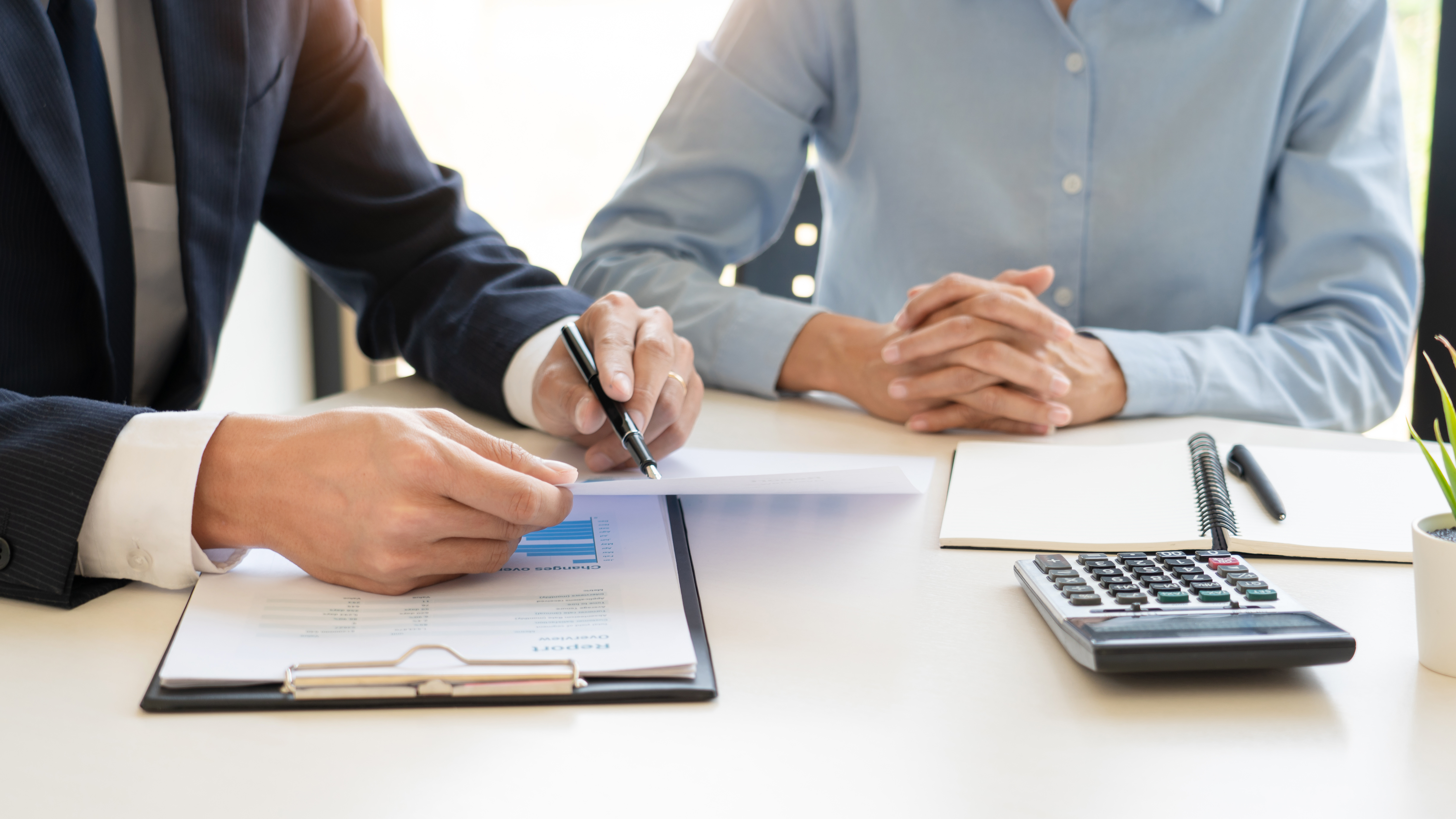 wealth management concept, business man and team analyzing financial statement for planning financial customer case in office